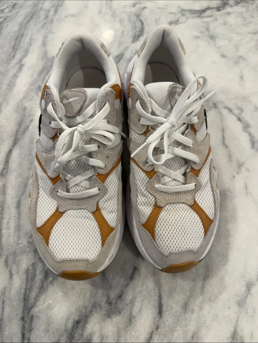 The Nike Tech Hera in Light Orewood